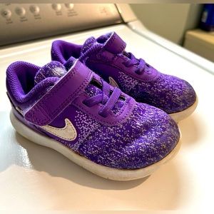 Purple Nike toddler sneakers